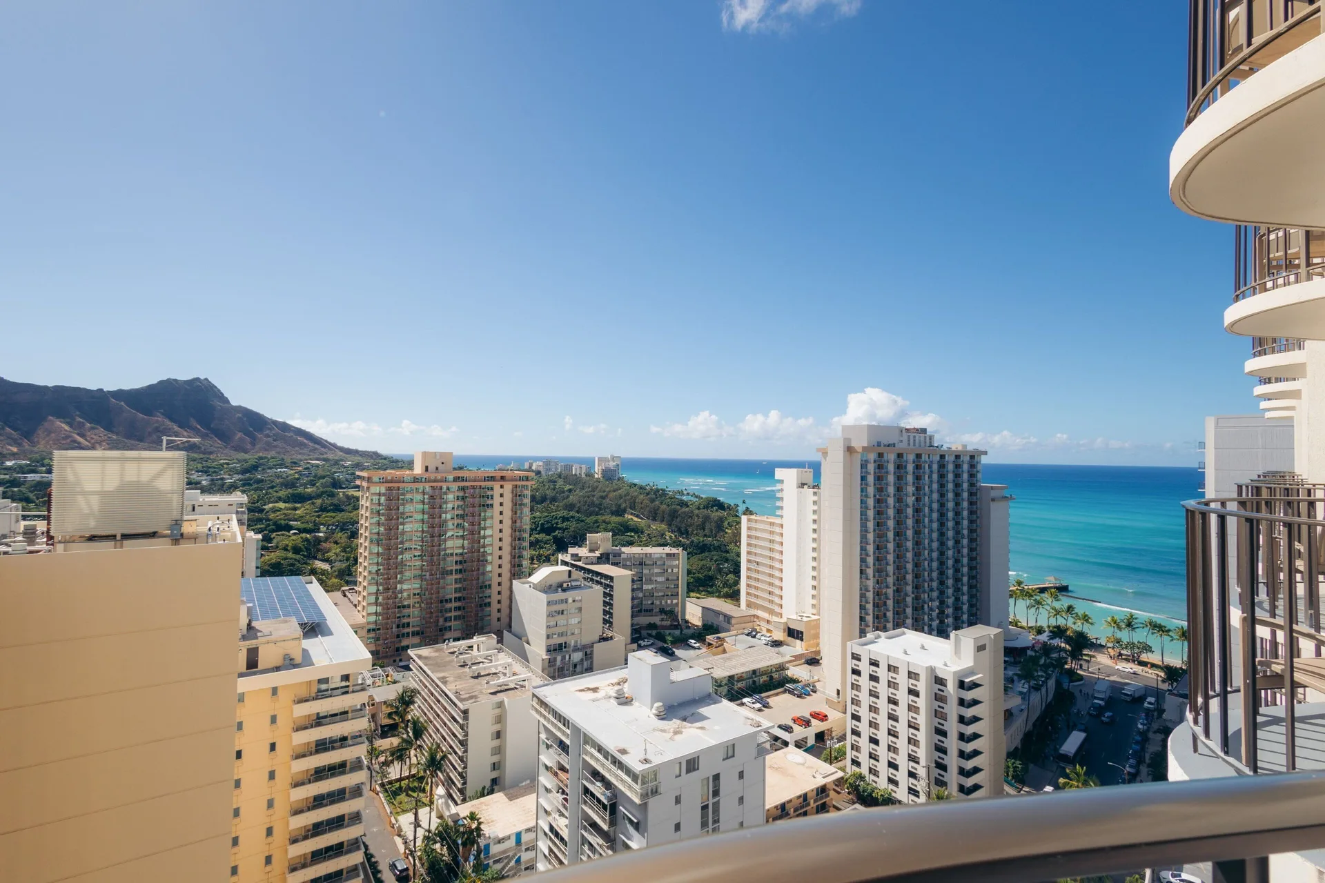 Diamondhead Ocean View Guest Room with Balcony at Waikiki Beach Marriott Resort & Spa Paoakalani Tower featuring iconic Diamond Head views.