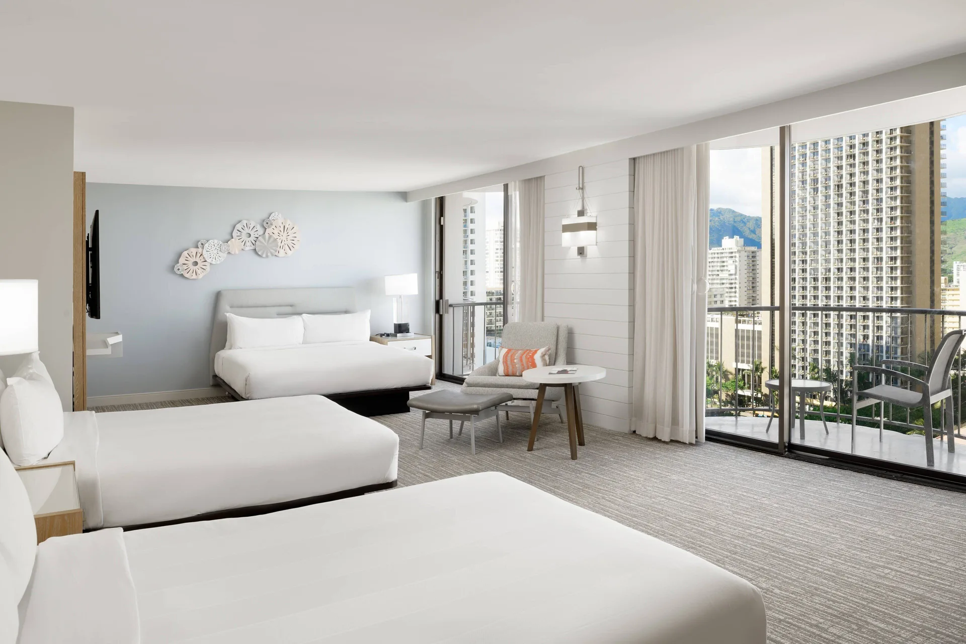 Family Junior Suite 1 and 2 City View Kealohilani Tower Accessible Roll-in Shower at Waikiki Beach Marriott Resort & Spa with multiple beds and accessibility features.