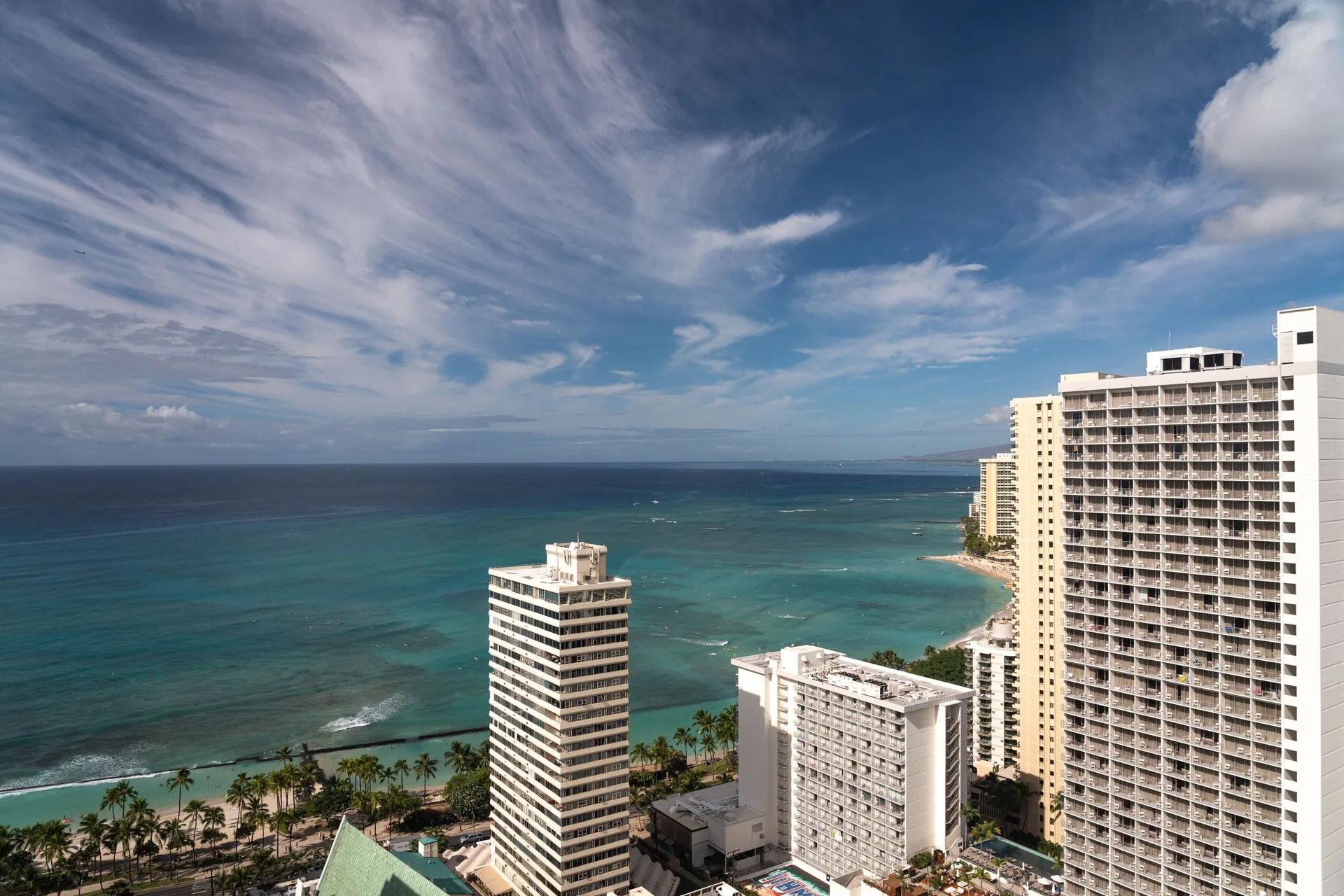 High ocean and Waikiki shoreline view from Waikiki Beach Marriott Resort & Spa.