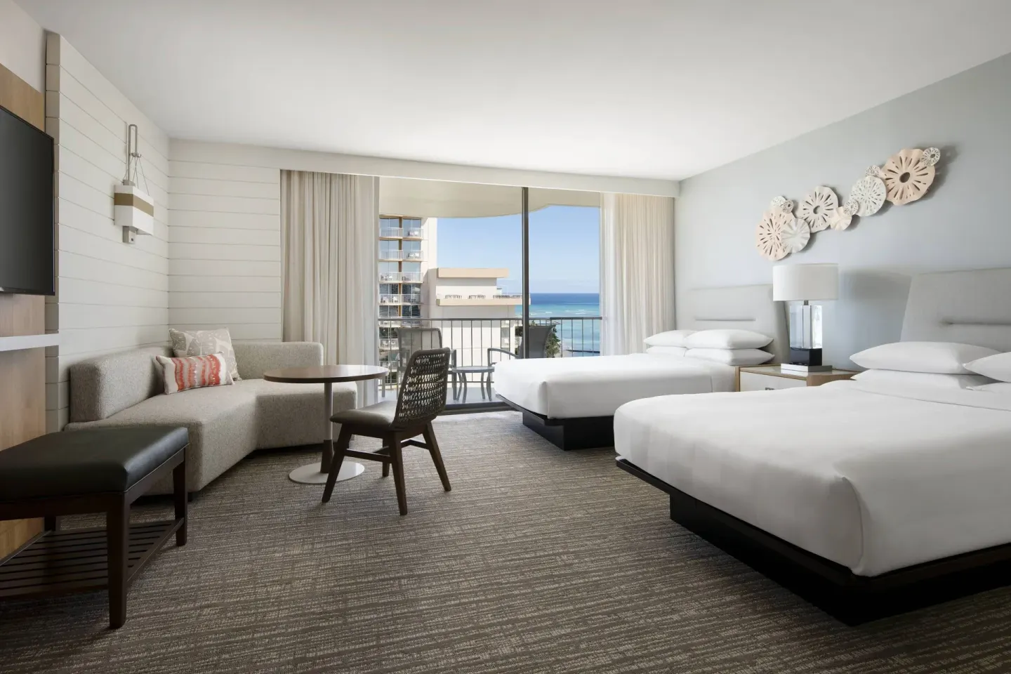 Two-bed ocean view room with balcony at Waikiki Beach Marriott Resort & Spa.