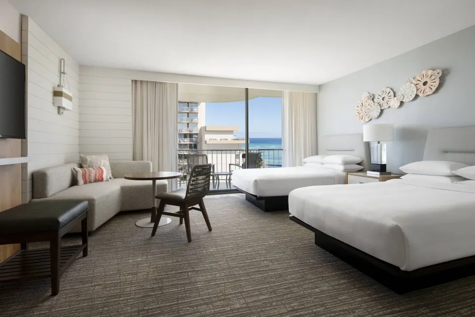 Two-bed ocean view room with balcony at Waikiki Beach Marriott Resort & Spa.