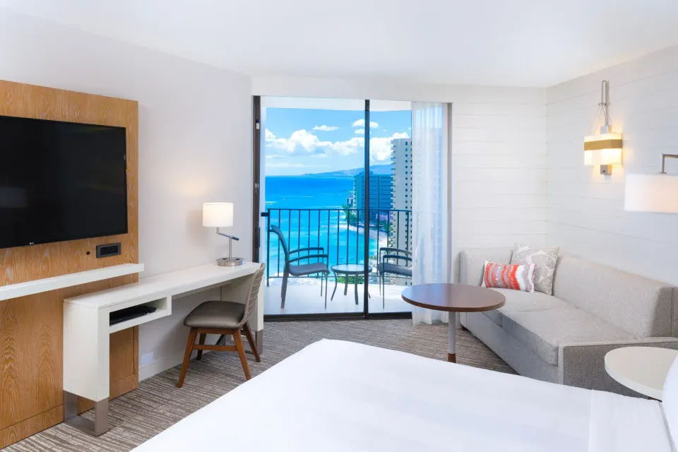 Ocean front king room with sofa bed and balcony at Waikiki Beach Marriott Resort & Spa.