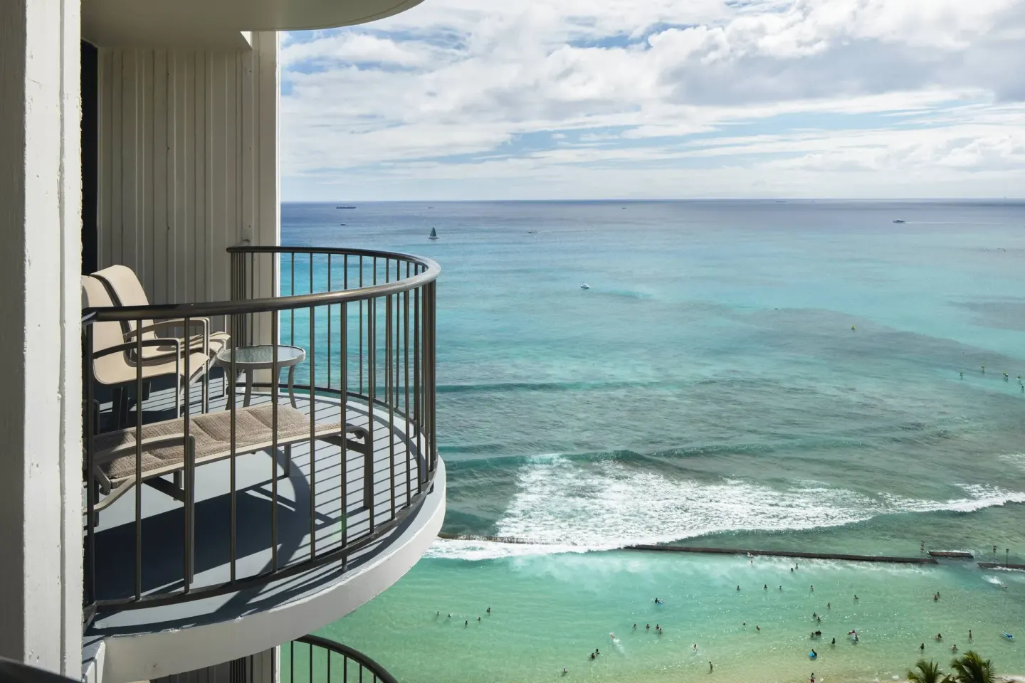 Ocean front balcony with turquoise water view at Waikiki Beach Marriott Resort & Spa.