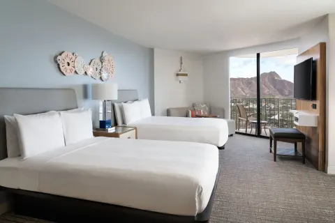Ocean Front Room with two beds and balcony at Waikiki Beach Marriott Resort & Spa.