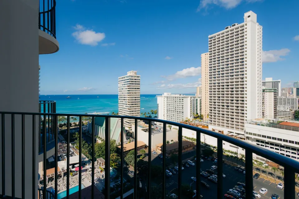 Balcony ocean view over Waikiki buildings at Waikiki Beach Marriott Resort & Spa.