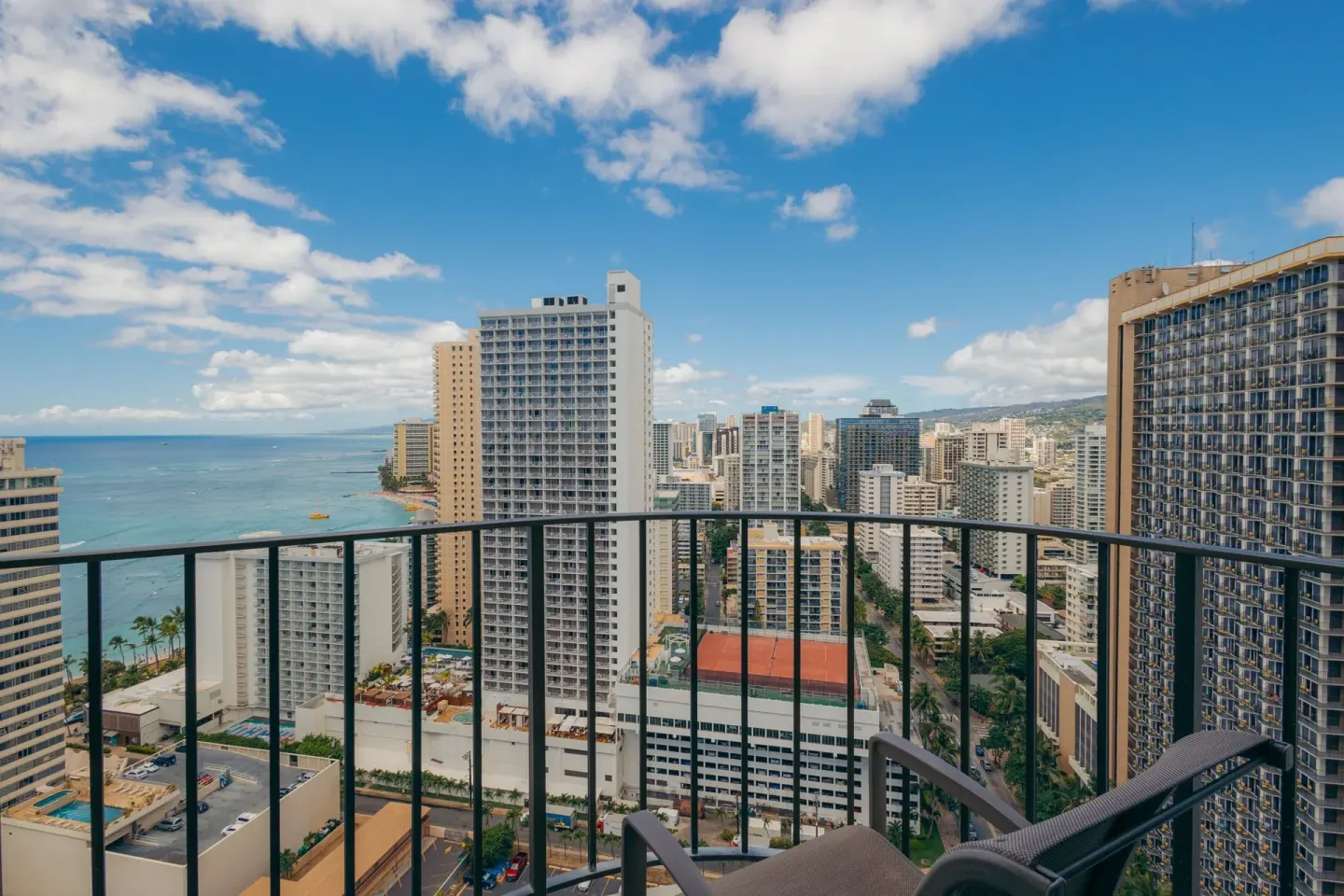 Ocean and Waikiki skyline view from a balcony at Waikiki Beach Marriott Resort & Spa.