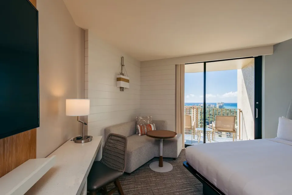 Paoakalani Ocean View room with king bed and sofa bed at Waikiki Beach Marriott Resort & Spa.