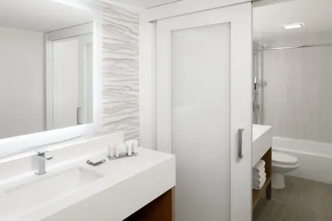Junior suite bathroom vanity and tub at Waikiki Beach Marriott Resort & Spa.