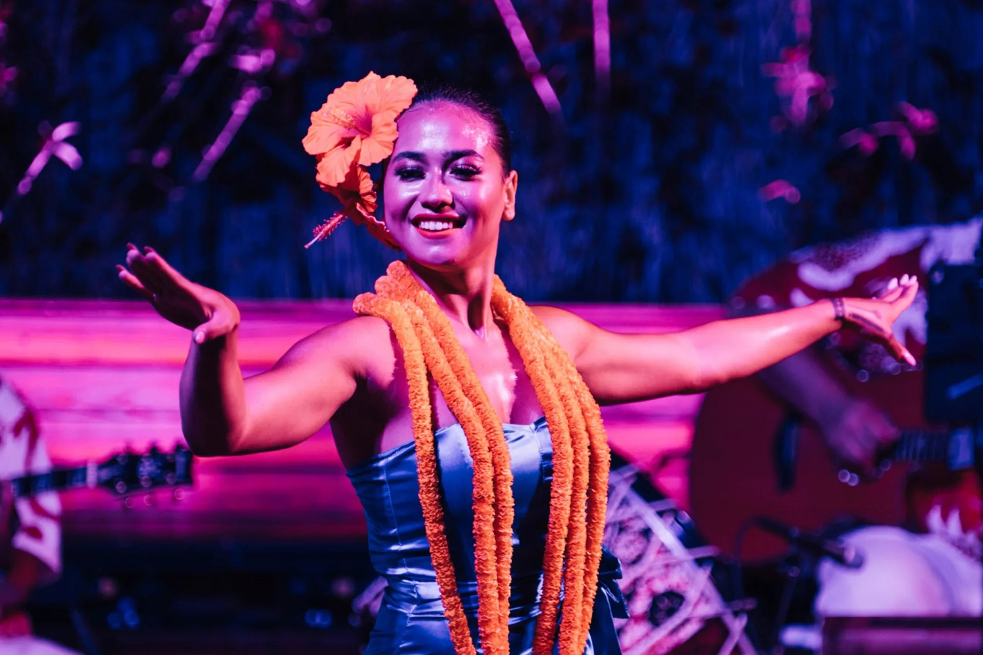 Hula dancer performing onstage at Waikiki Beach Marriott Resort & Spa.