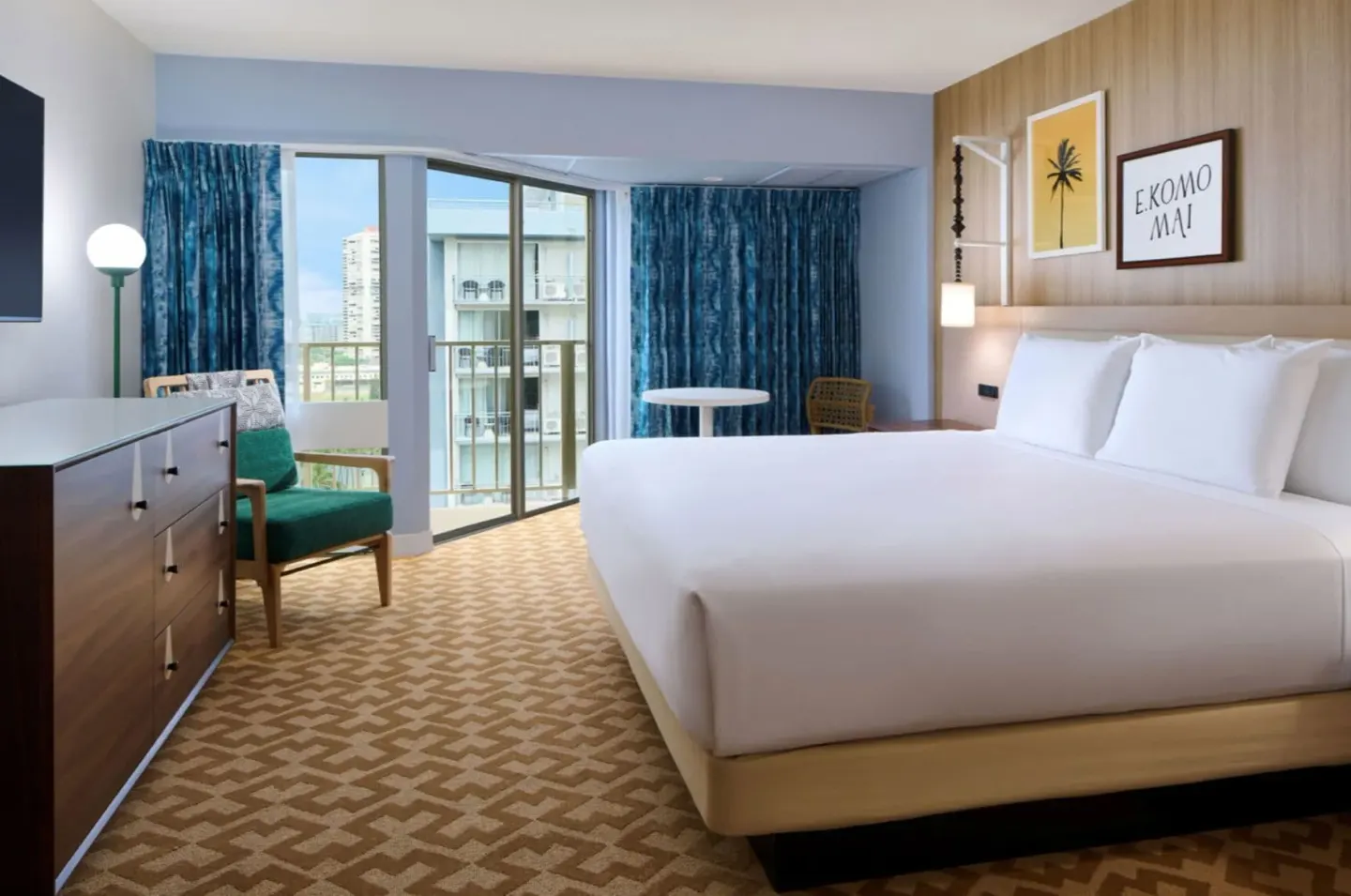 Malia Tower City View guest room with king bed and balcony at Waikiki Malia.