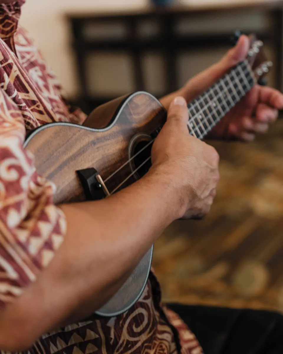 A musician plays a ukulele at Waikiki Resort Hotel.