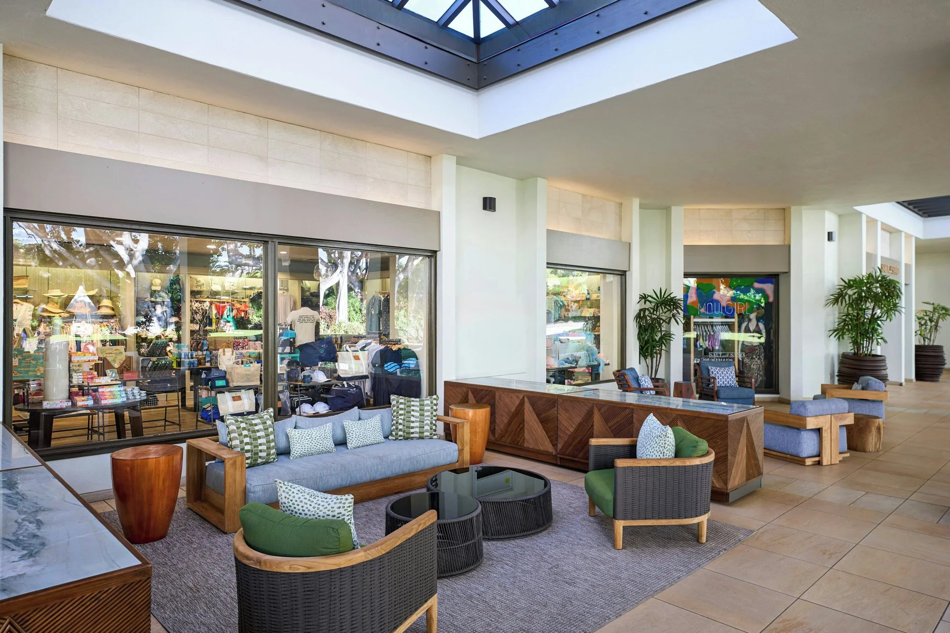 Covered resort lounge seating near shop windows at Wailea Beach Resort - Marriott, Maui.