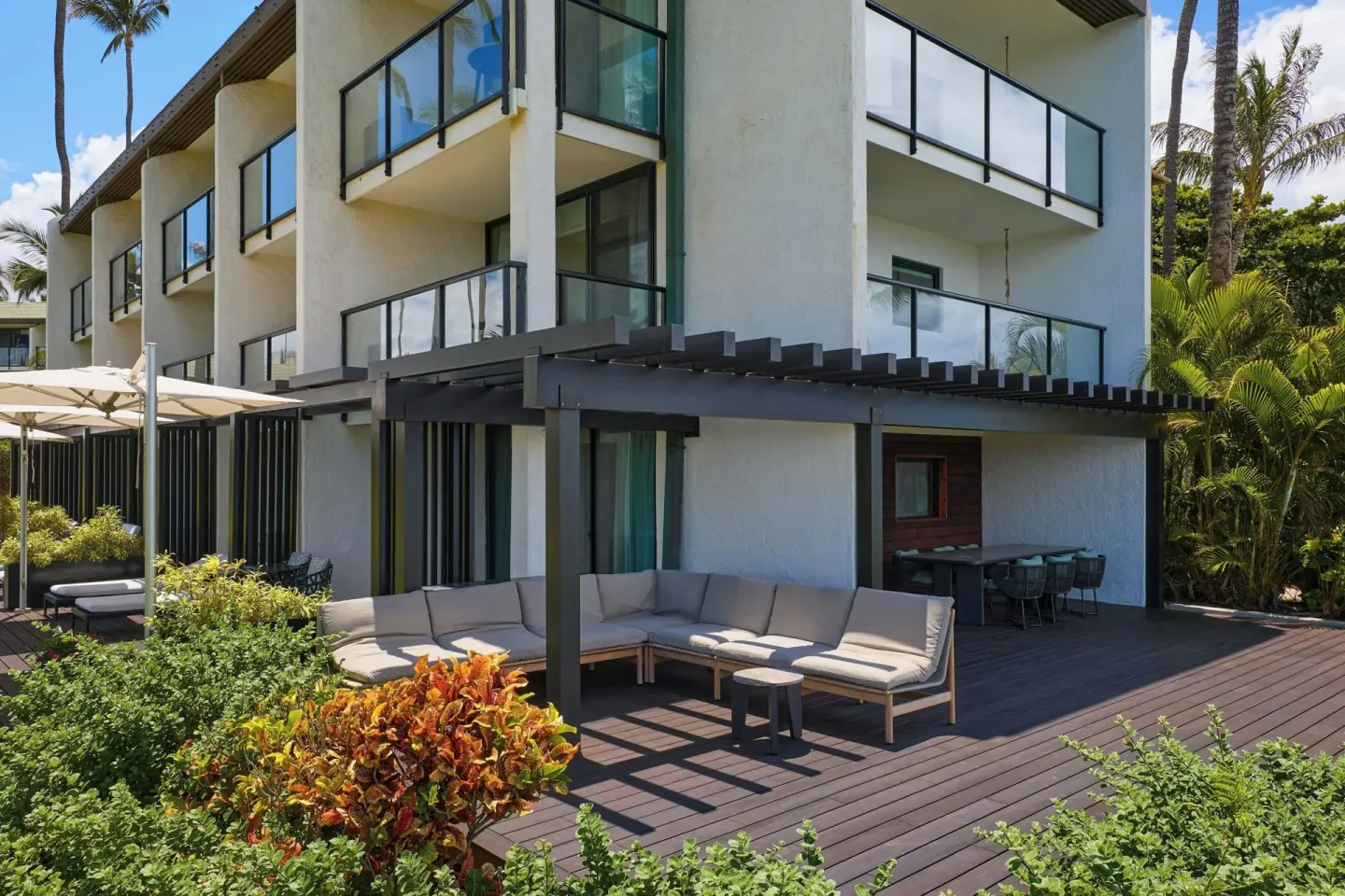 Garden terrace with lounge seating outside suites at Wailea Beach Resort - Marriott, Maui.