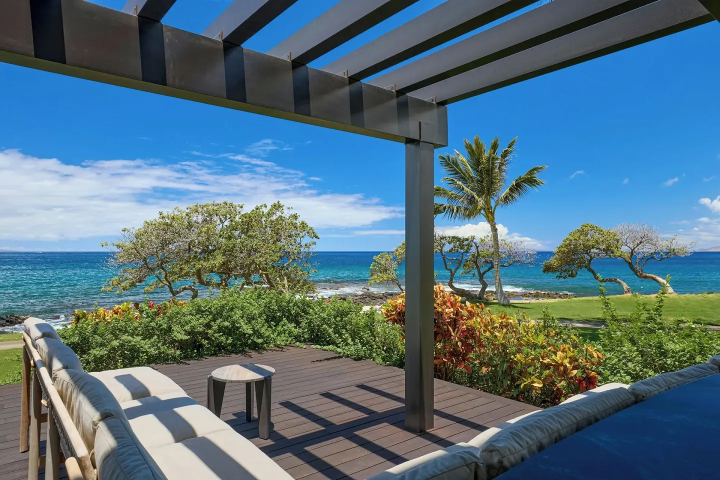 Ocean view terrace with cushioned seating at Wailea Beach Resort - Marriott, Maui.