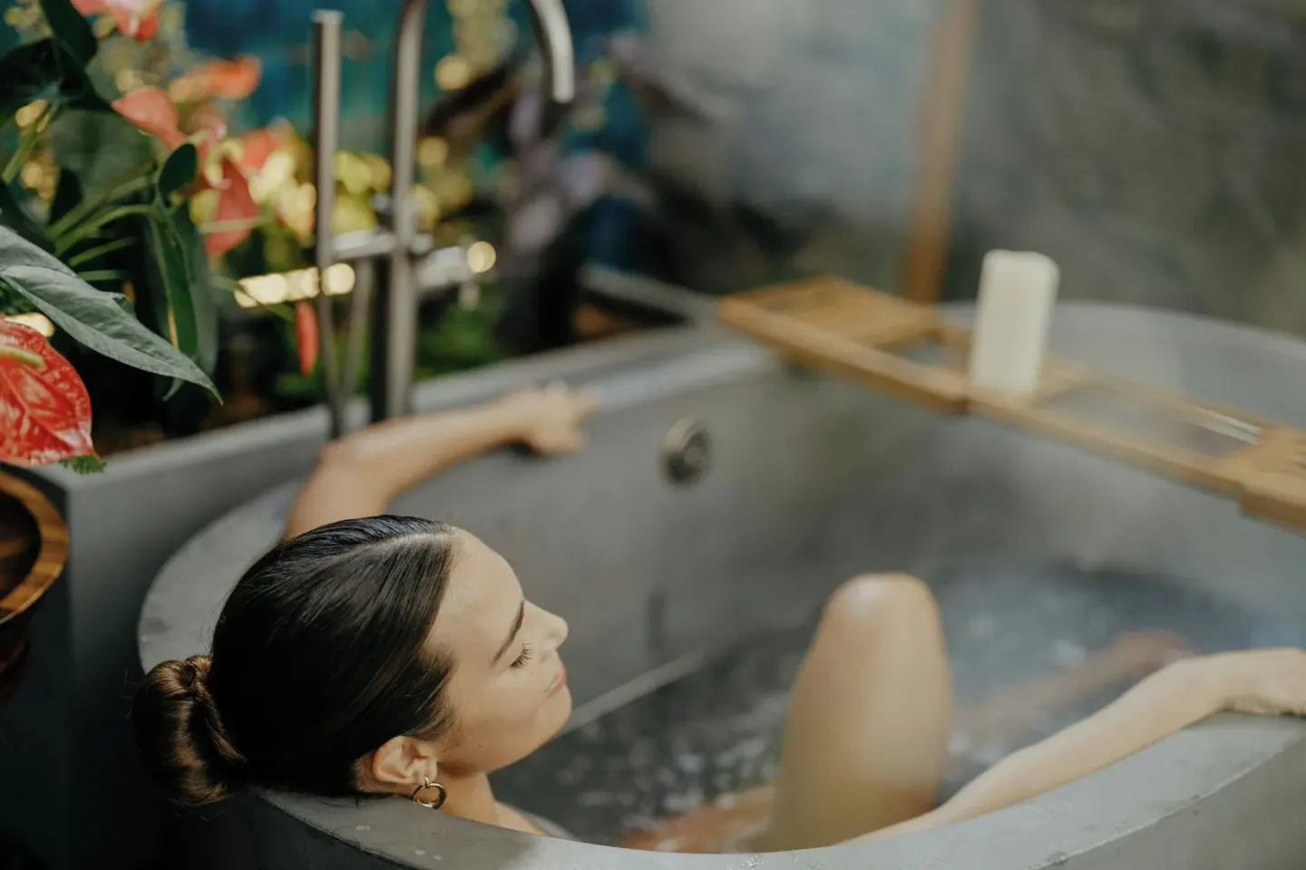 Guest soaking in an outdoor tub at Wailea Beach Resort - Marriott, Maui.
