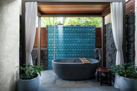 Private outdoor bath area with tub and shower at Wailea Beach Resort - Marriott, Maui.