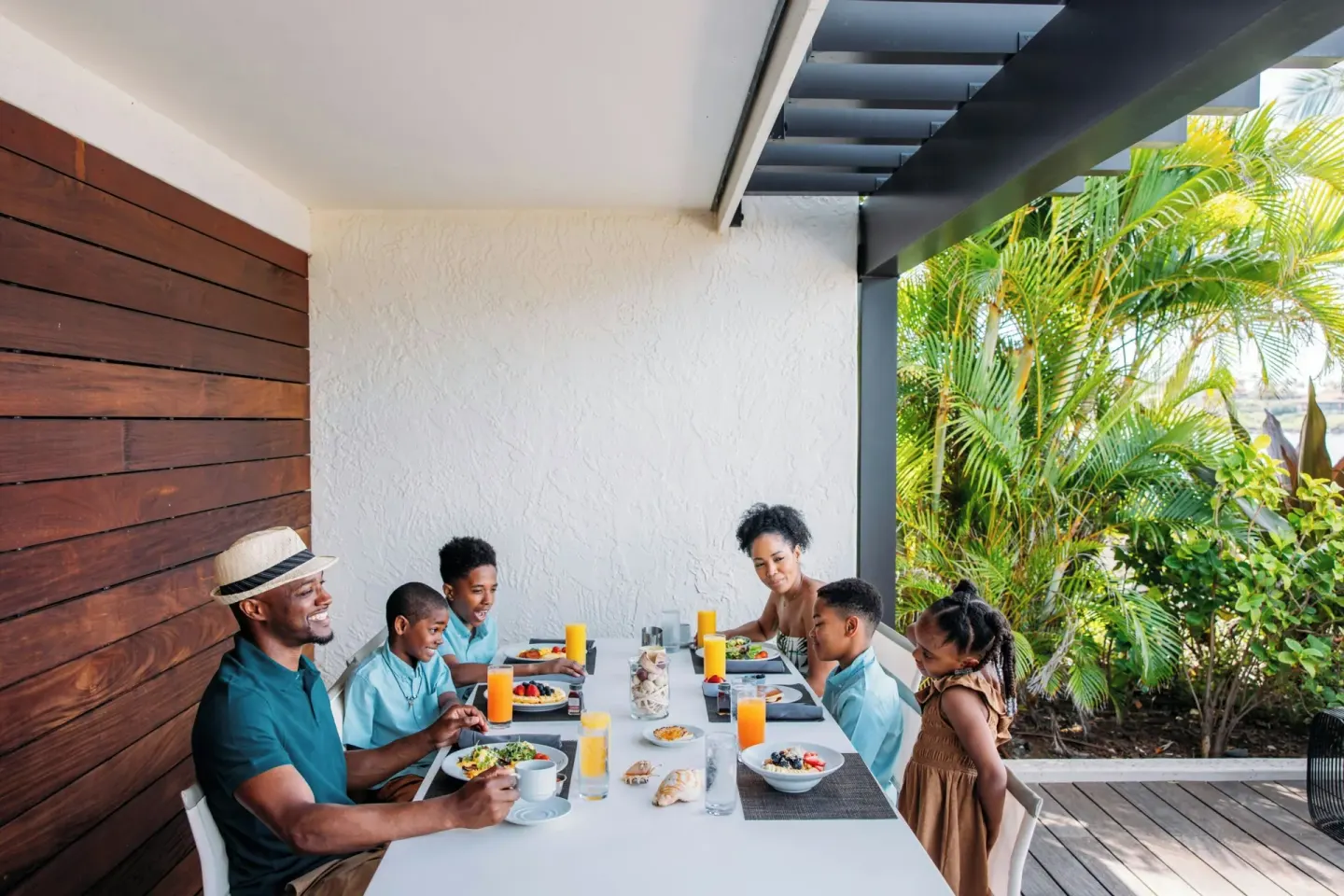 Family has breakfast on a private terrace at Wailea Beach Resort - Marriott, Maui.