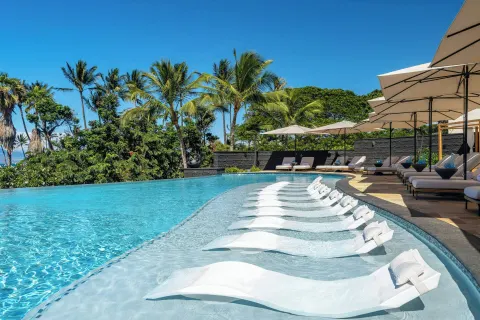 Resort pool with in-water lounge chairs at Wailea Beach Resort - Marriott, Maui.