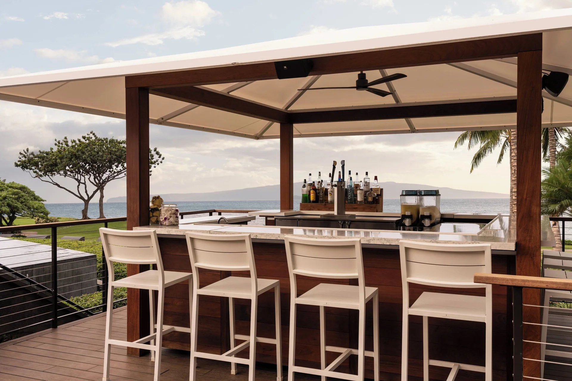 Open-air ocean view bar with white stools at Wailea Beach Resort - Marriott, Maui.