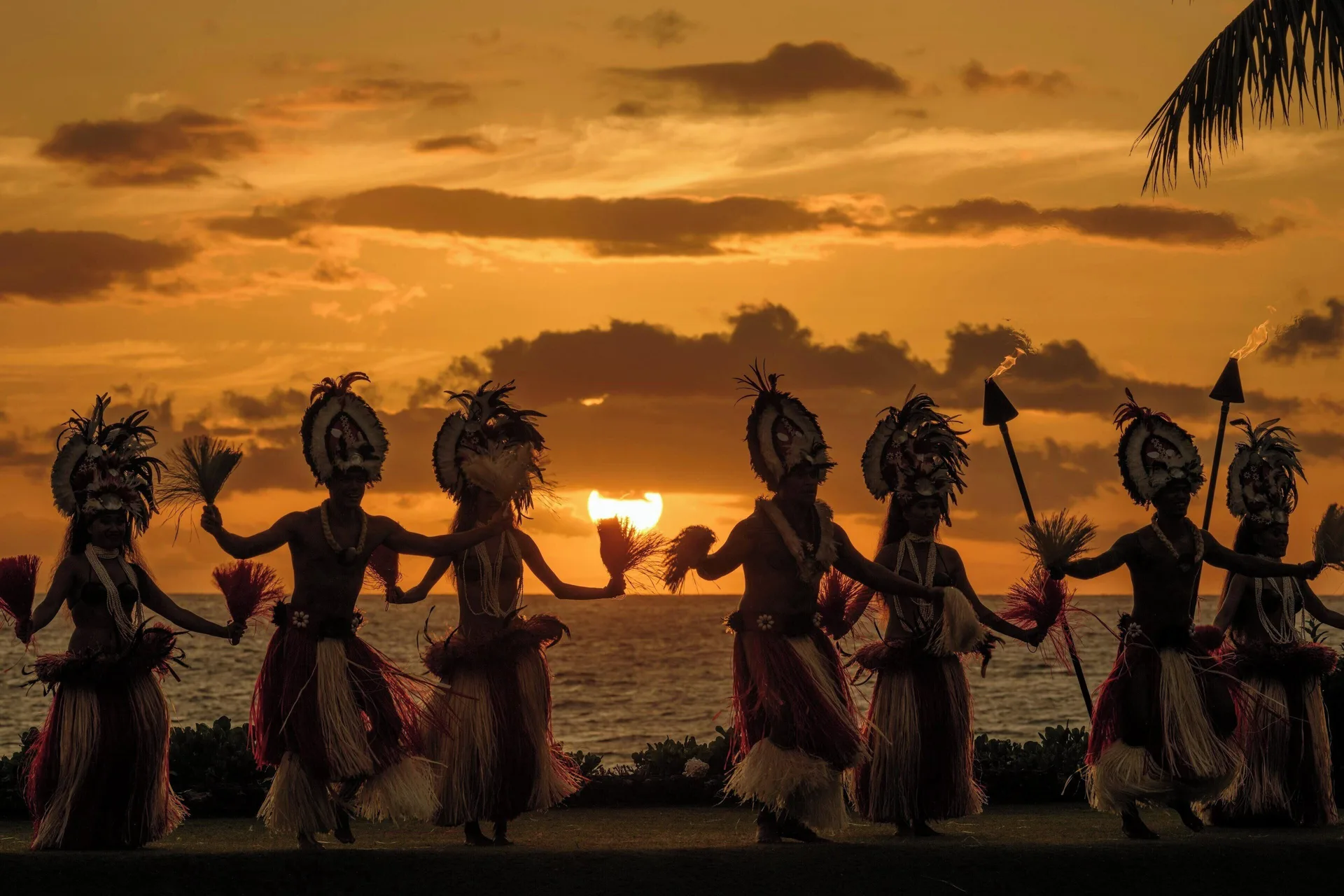 Silhouetted luau dancers at sunset at Wailea Beach Resort - Marriott, Maui.