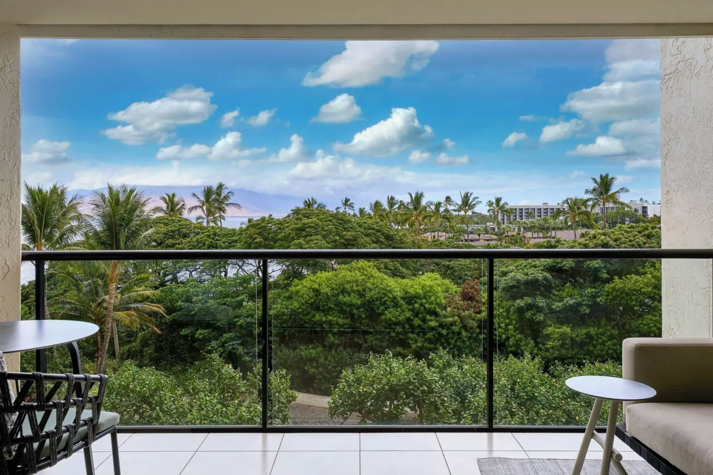 Junior suite balcony with garden and partial ocean view at Wailea Beach Resort - Marriott, Maui.