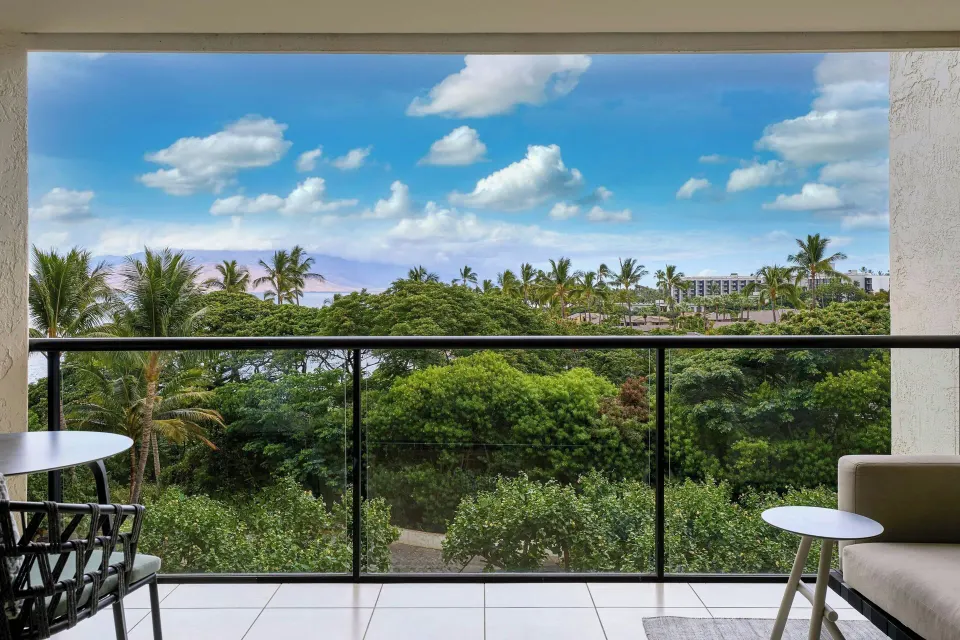 Junior suite balcony with garden and partial ocean view at Wailea Beach Resort - Marriott, Maui.
