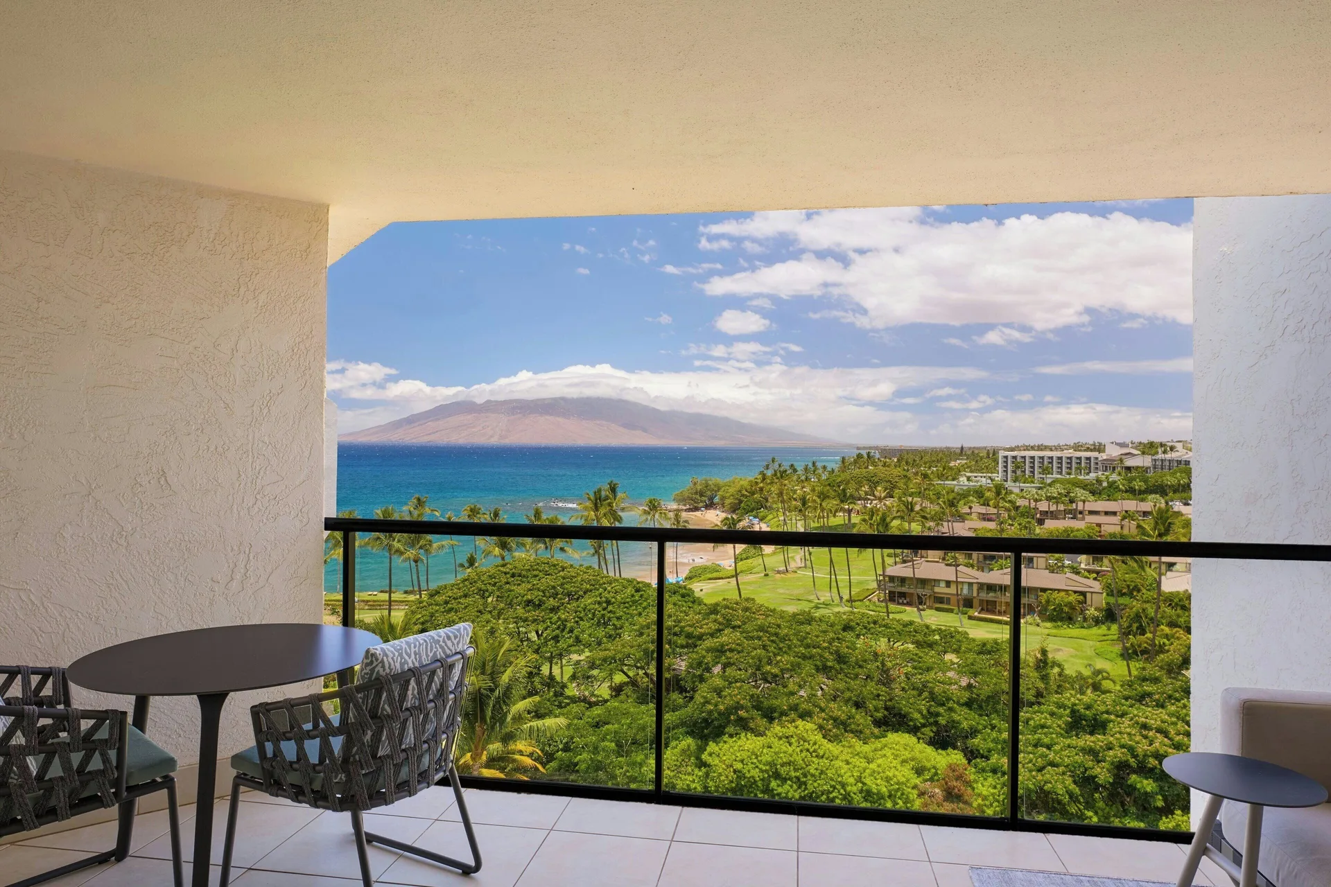 Ocean-view balcony with table and chairs at Wailea Beach Resort - Marriott, Maui.