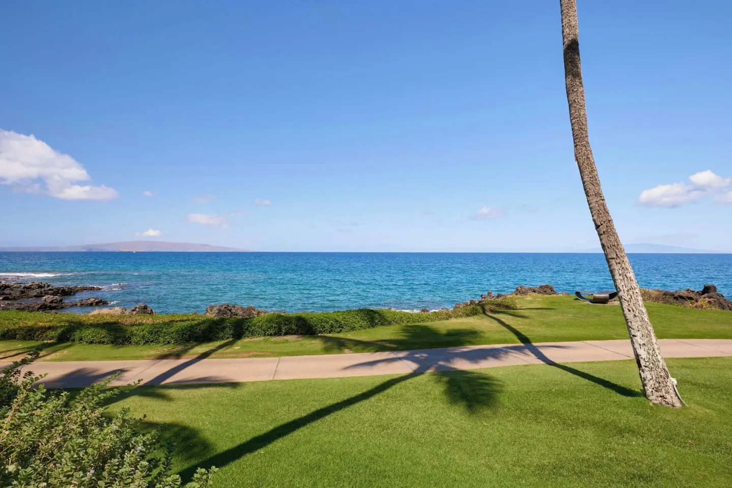Oceanfront lawn and blue water view from the suite at Wailea Beach Resort - Marriott, Maui.