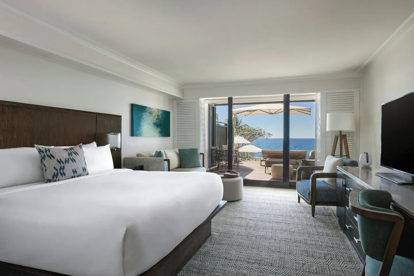 Premium king room with seating and patio access at Wailea Beach Resort - Marriott, Maui.
