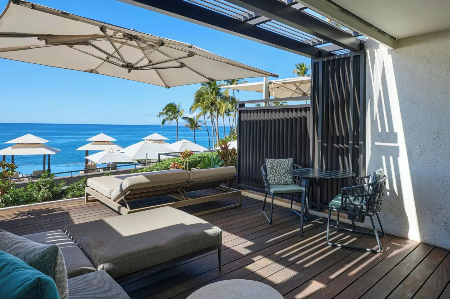 Premium room sundeck with dining table and loungers at Wailea Beach Resort - Marriott, Maui.