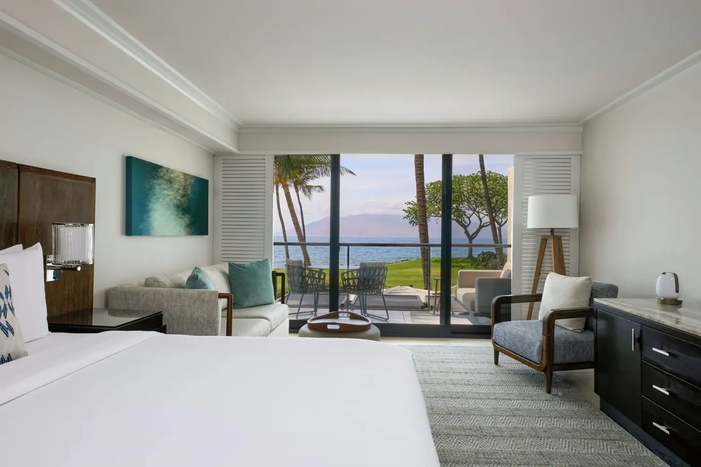 Premium Ocean View king room at Wailea Beach Resort - Marriott, Maui with seating and balcony doors.