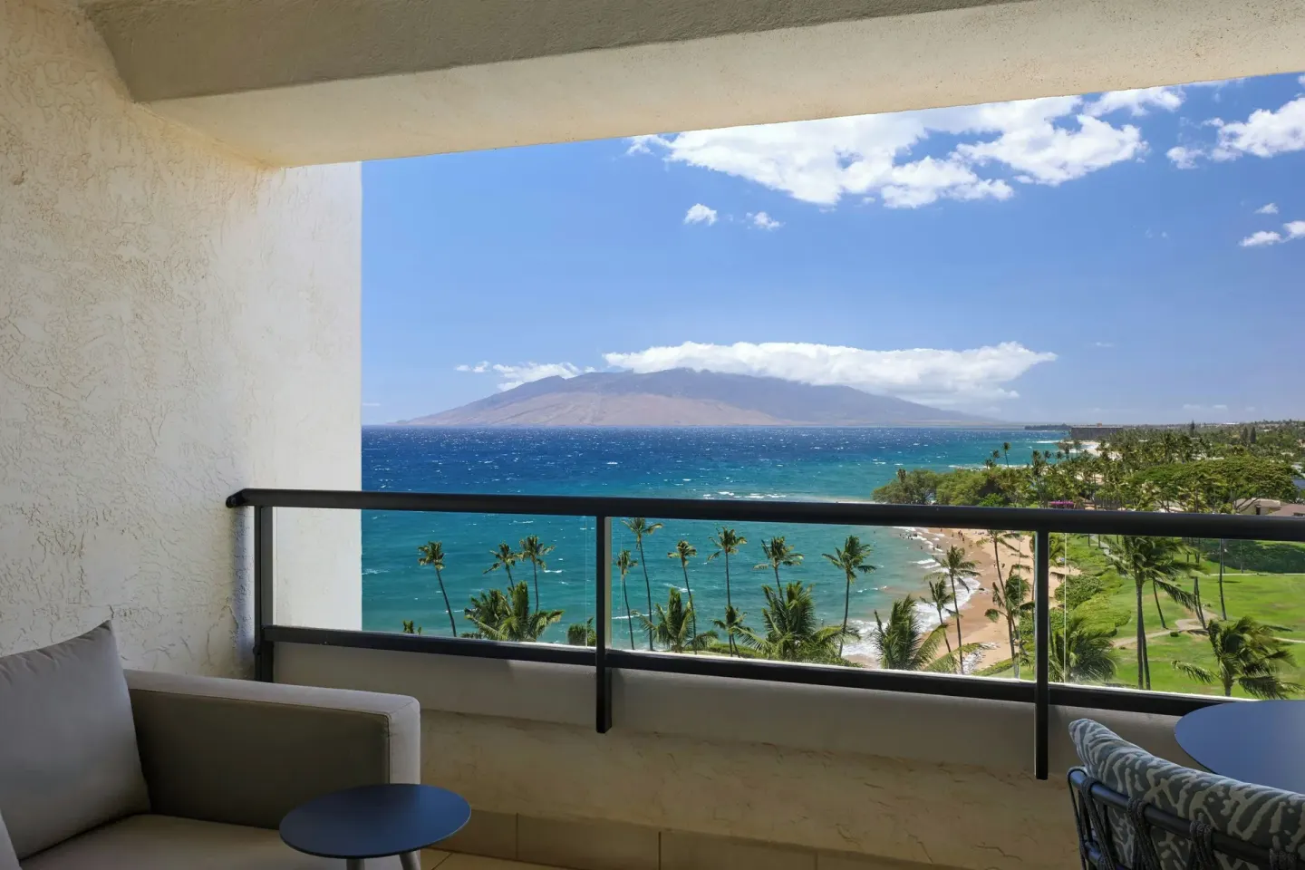 Ocean-view suite balcony with seating at Wailea Beach Resort - Marriott, Maui.