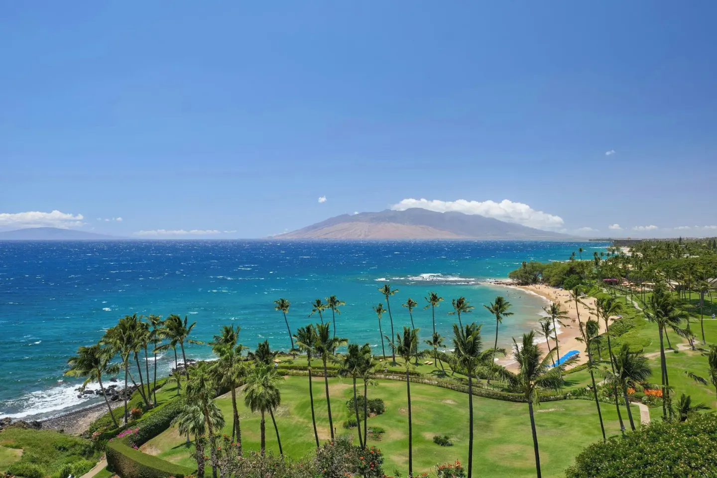 Ocean view over beach, palms, and resort grounds at Wailea Beach Resort - Marriott, Maui.