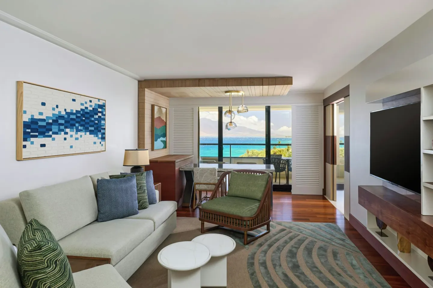 Ocean-view suite living room with sofa and balcony at Wailea Beach Resort - Marriott, Maui.