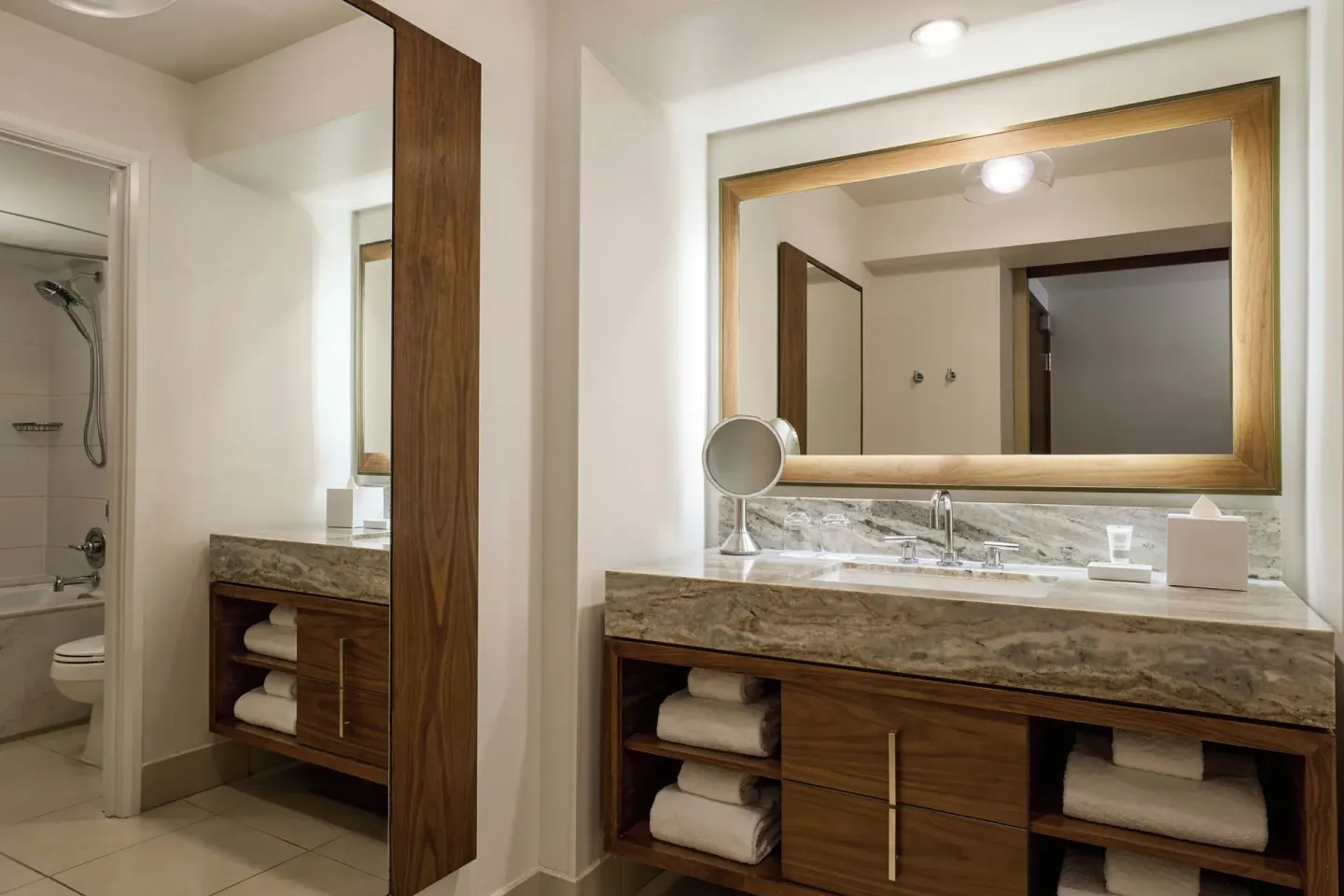 Guest room bathroom vanity and shower area at Wailea Beach Resort - Marriott, Maui.