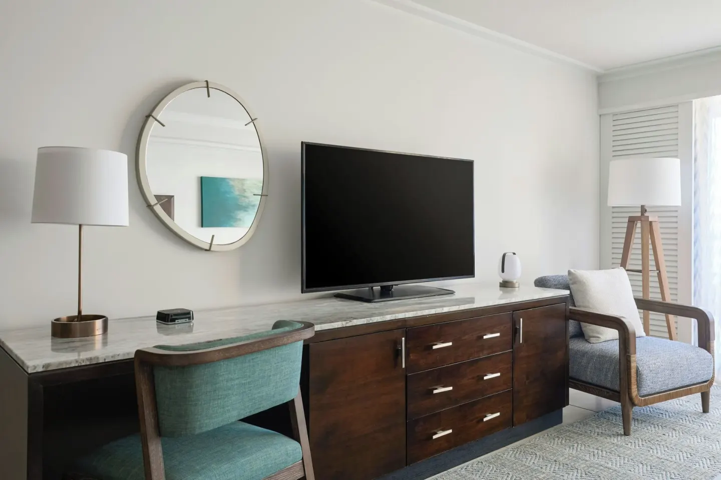 Desk, TV, dresser and lounge chair in an oceanfront room at Wailea Beach Resort - Marriott, Maui.