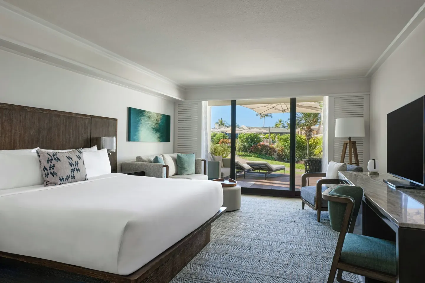 King guest room with sitting area and lanai view at Wailea Beach Resort - Marriott, Maui.