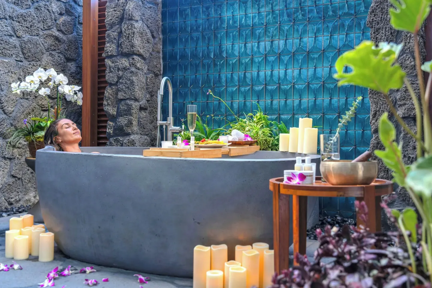 Garden Oasis lanai soaking tub with candles and plants at Wailea Beach Resort - Marriott, Maui.