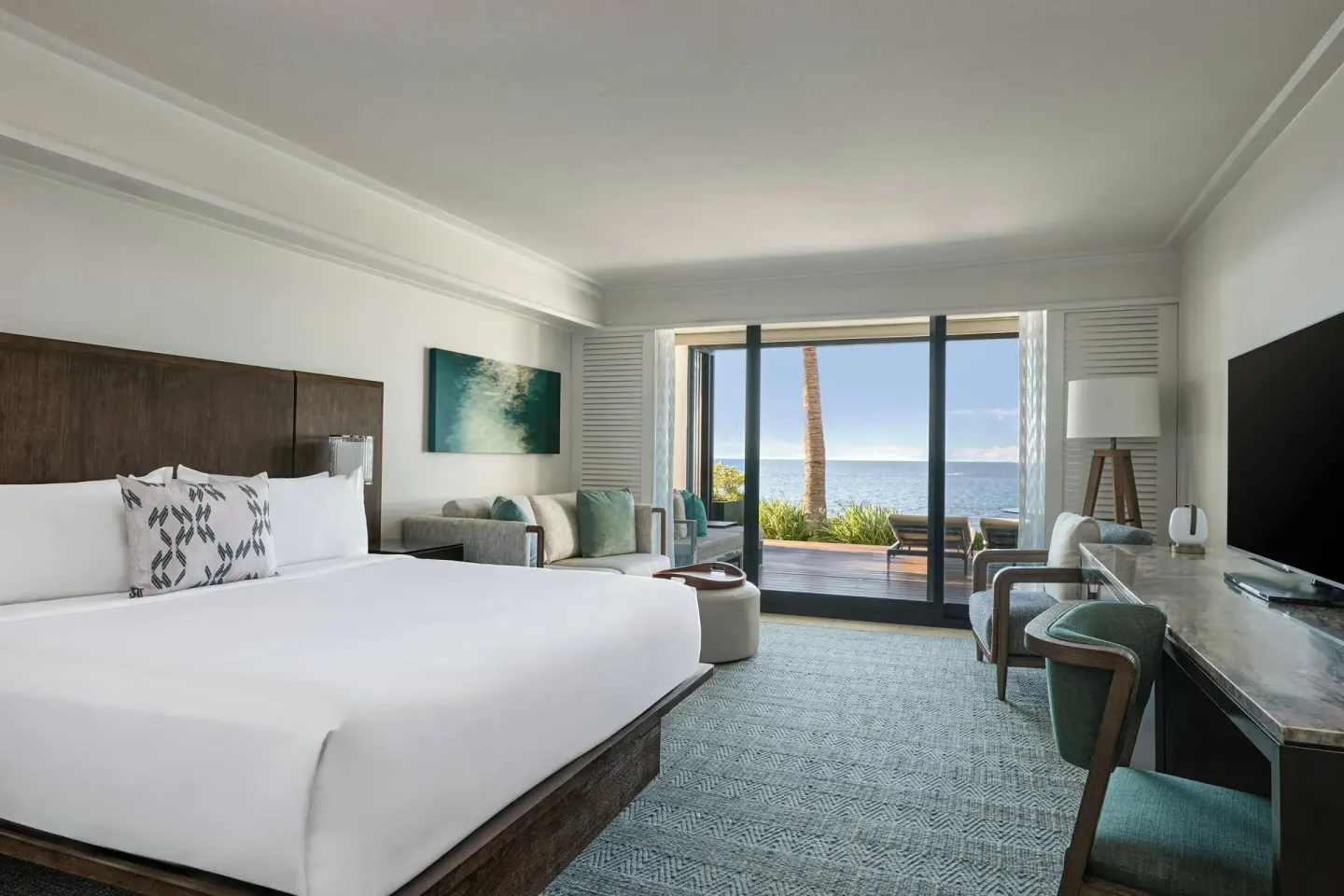 King bed oceanfront room with TV, desk, and sundeck at Wailea Beach Resort - Marriott, Maui.