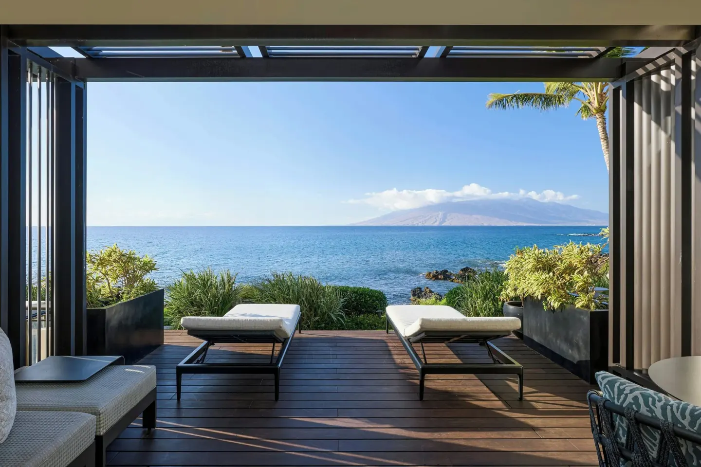 Oceanfront room sundeck with lounge chairs at Wailea Beach Resort - Marriott, Maui.