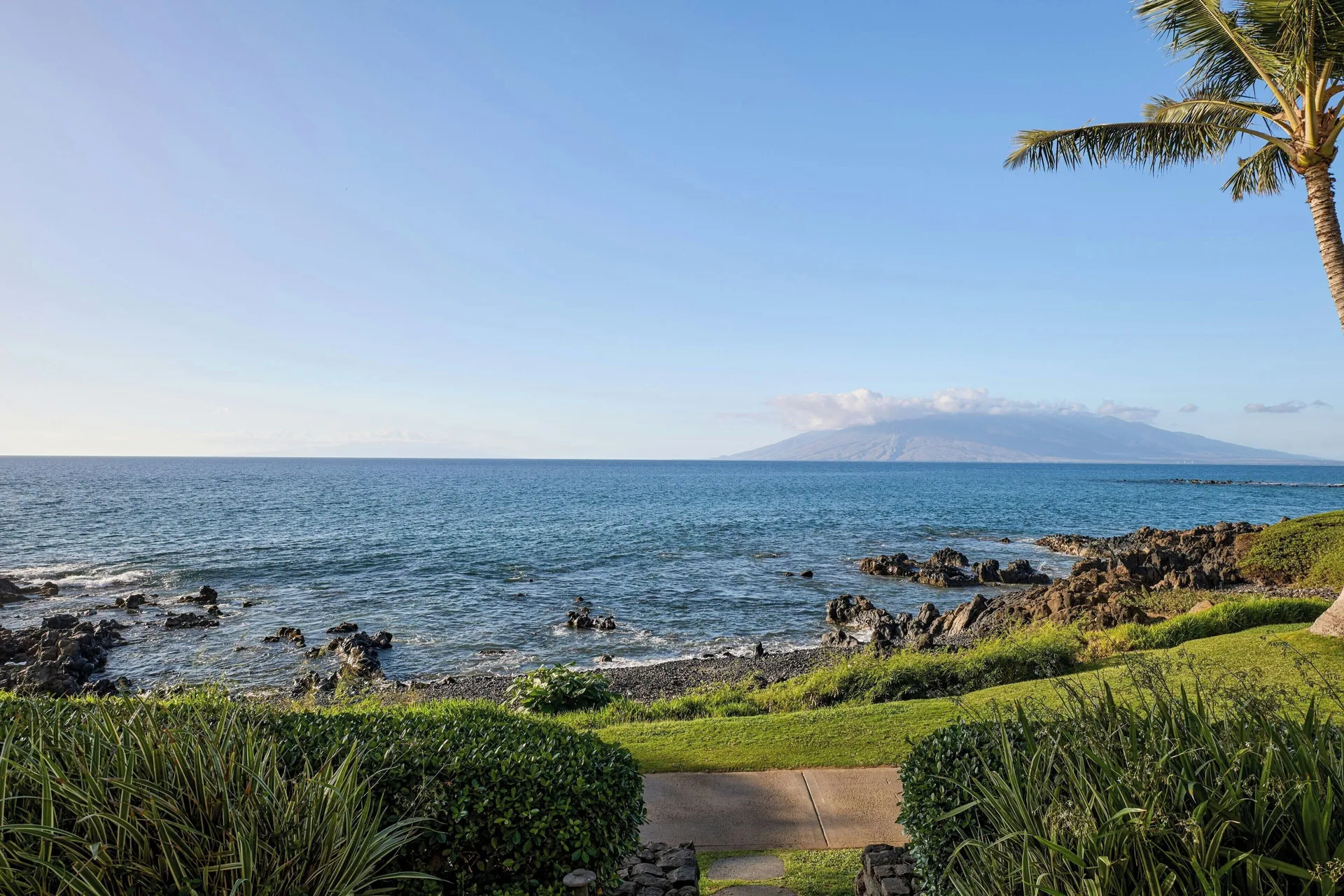 Oceanfront ground-floor room view over lava rocks and ocean at Wailea Beach Resort - Marriott, Maui.