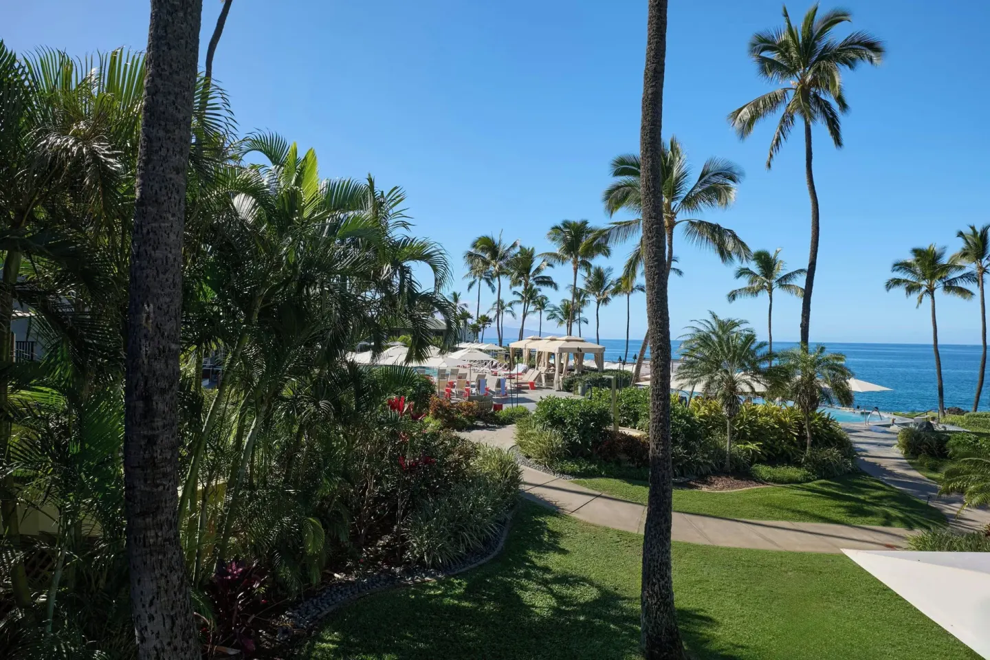 Partial ocean view over palms and resort gardens at Wailea Beach Resort - Marriott, Maui.