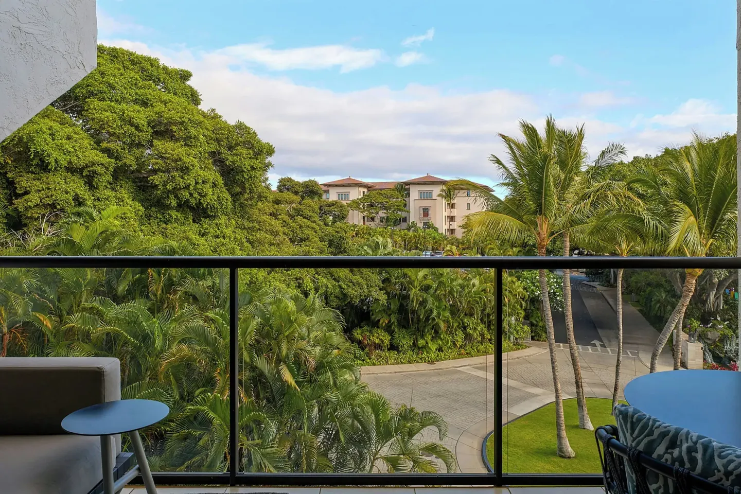 Balcony seating overlooks palms and gardens at Wailea Beach Resort - Marriott, Maui.