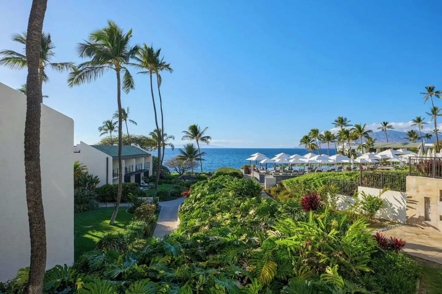 Partial ocean view over palms and resort rooftops at Wailea Beach Resort - Marriott, Maui.