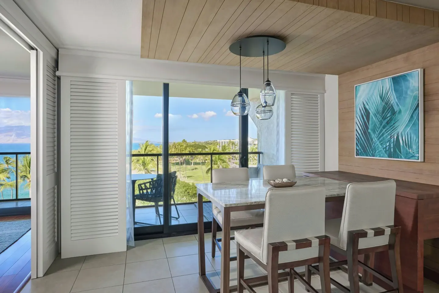 Ocean-view suite dining area with balcony at Wailea Beach Resort - Marriott, Maui.