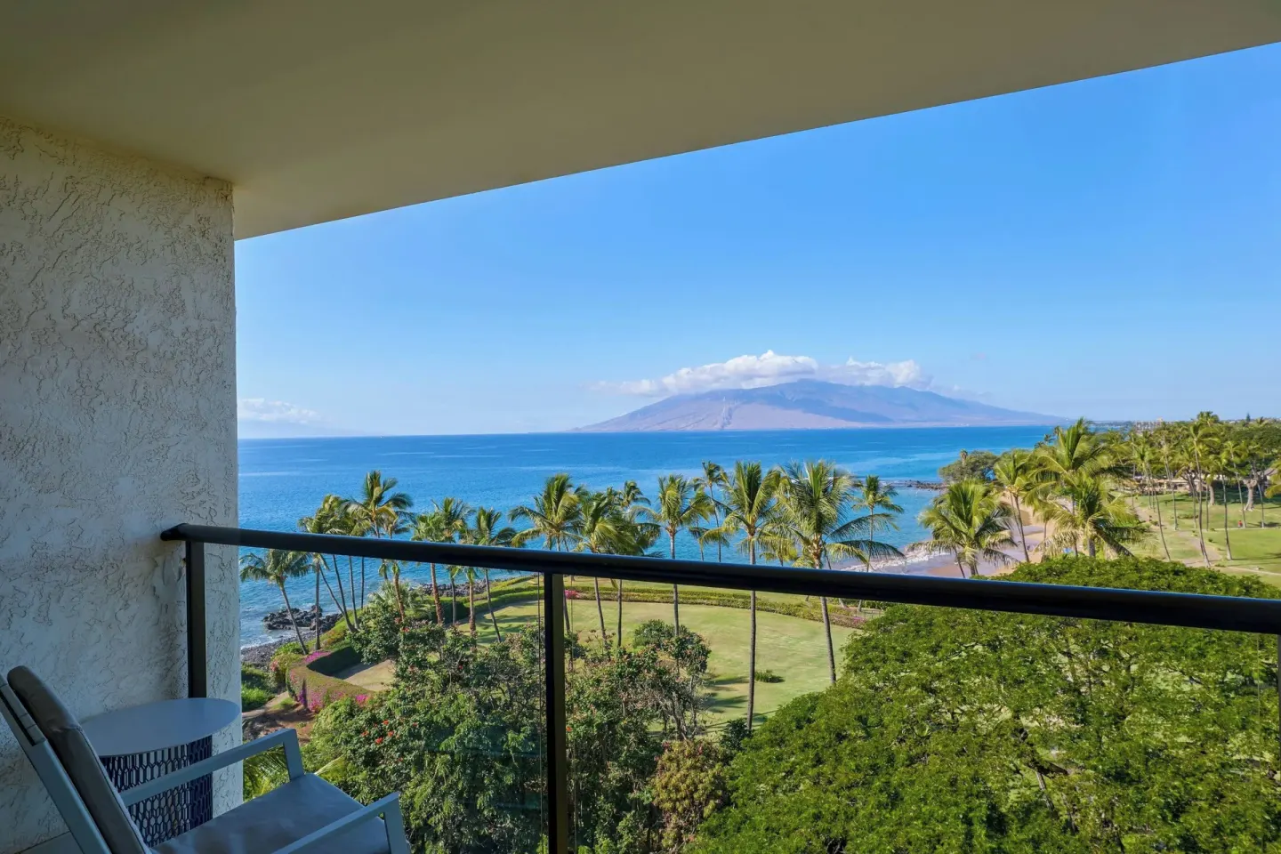 Ocean-view suite balcony with chairs and island view at Wailea Beach Resort - Marriott, Maui.