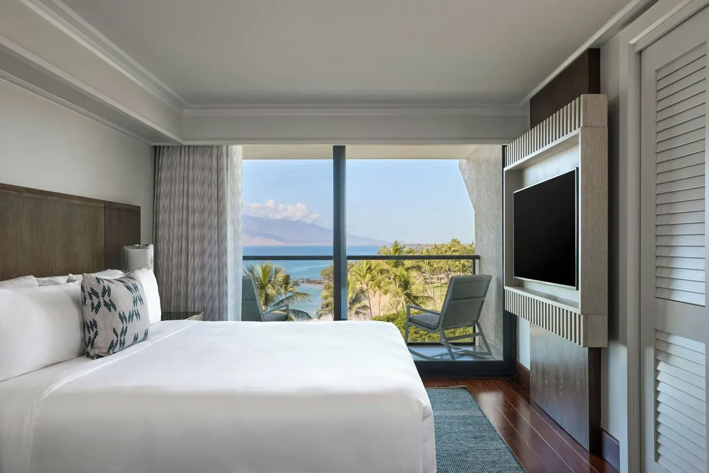 One-bedroom ocean-view suite with king bed and balcony at Wailea Beach Resort - Marriott, Maui.