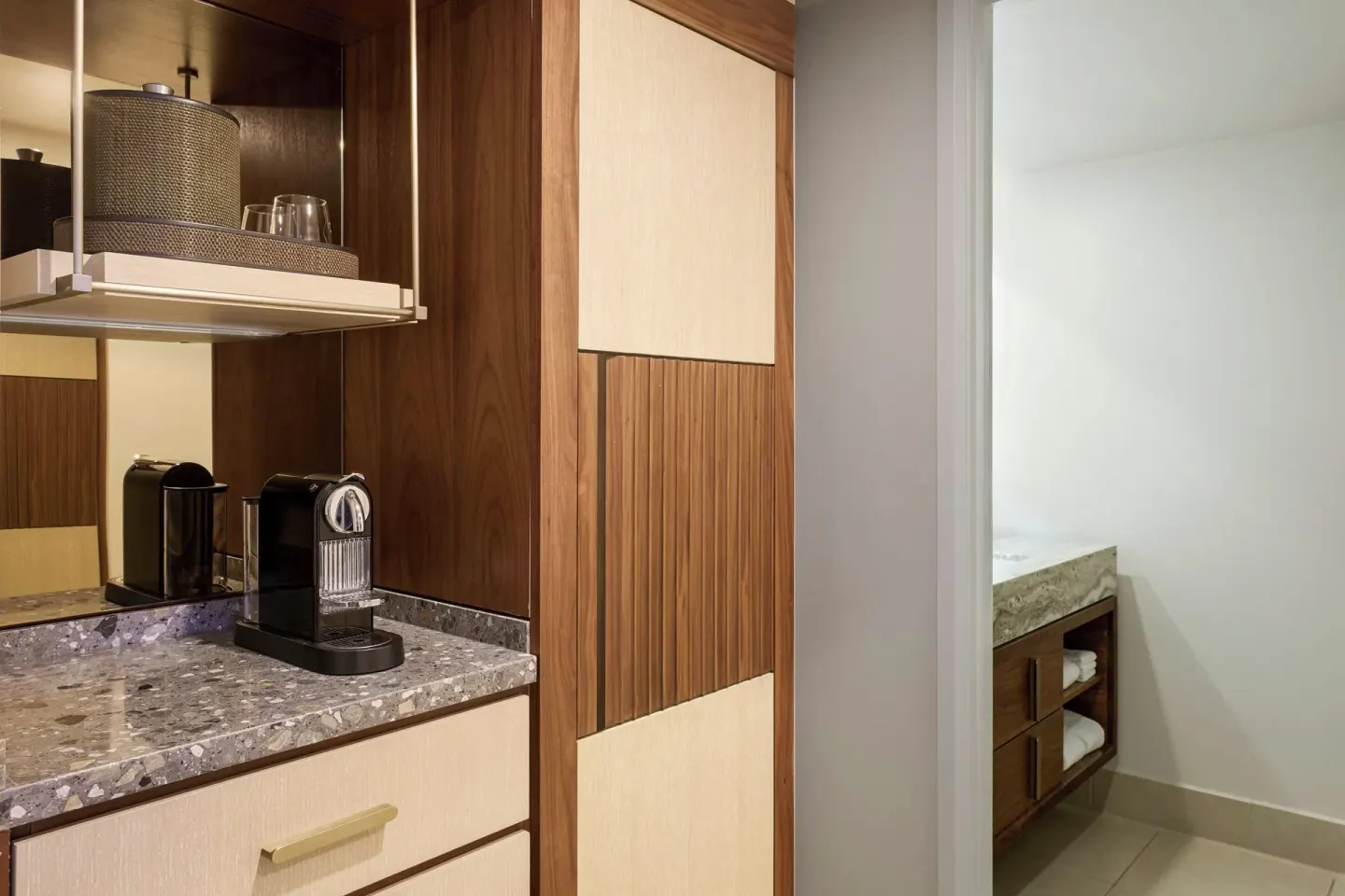 Suite refreshment cabinet and bathroom entry at Wailea Beach Resort - Marriott, Maui.
