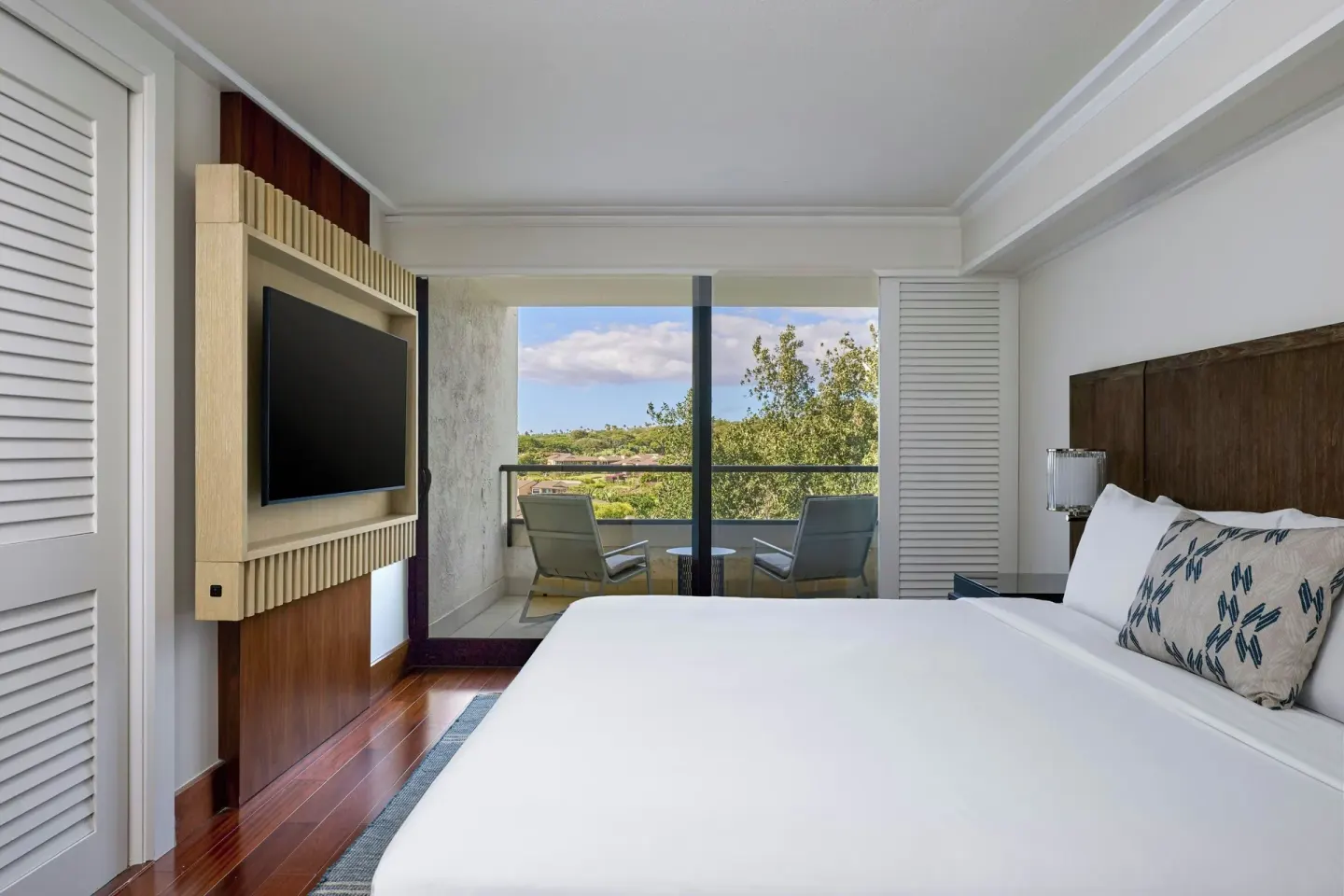 One bedroom garden view suite with king bed and balcony at Wailea Beach Resort - Marriott, Maui.