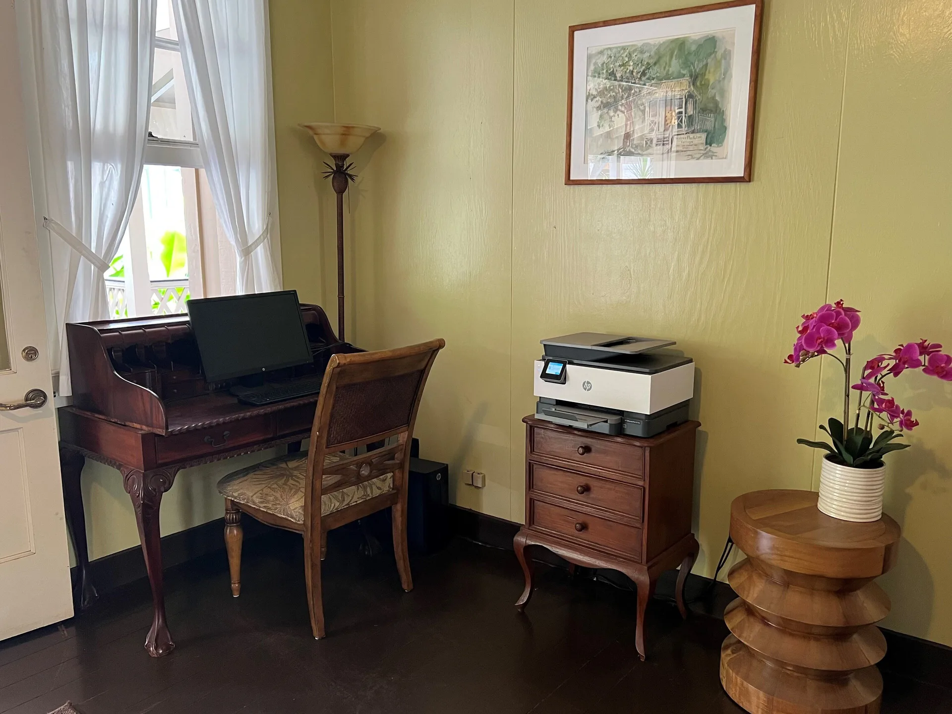 Business desk with computer and printer inside Waimea Plantation Cottages.